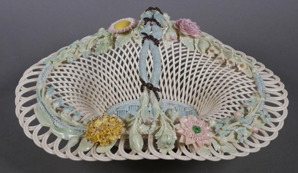 Appraisal: Belleek Masterpiece Collection basket Four-strand two pad Belleek mark on