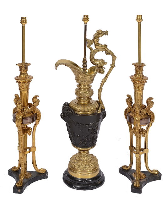 Appraisal: A PAIR OF REPRODUCTION REGENCY STYLE GILT METAL TABLE LAMPS