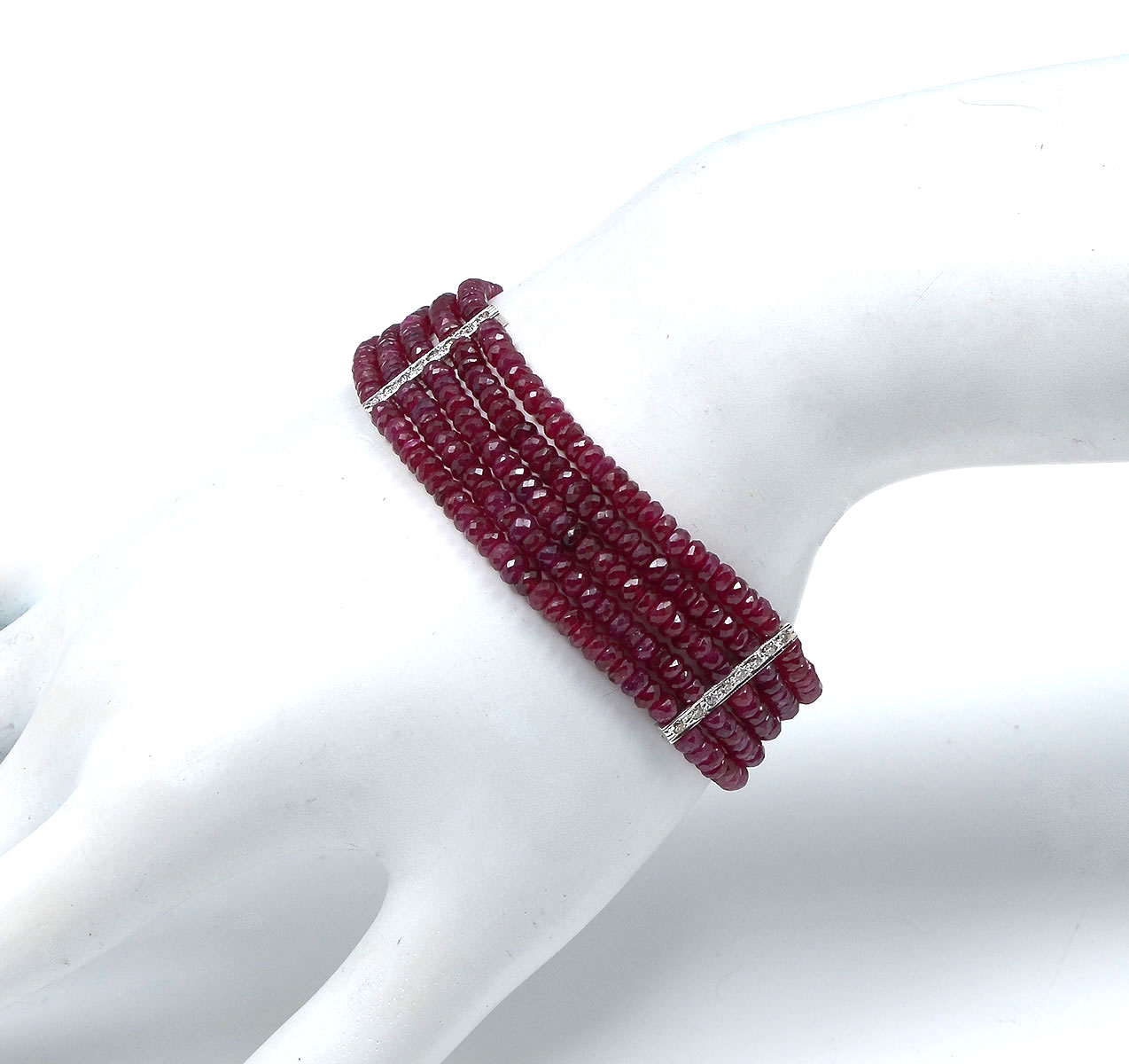 Appraisal: STRAND K RUBY DIAMOND BRACELET strands of micro faceted rubies