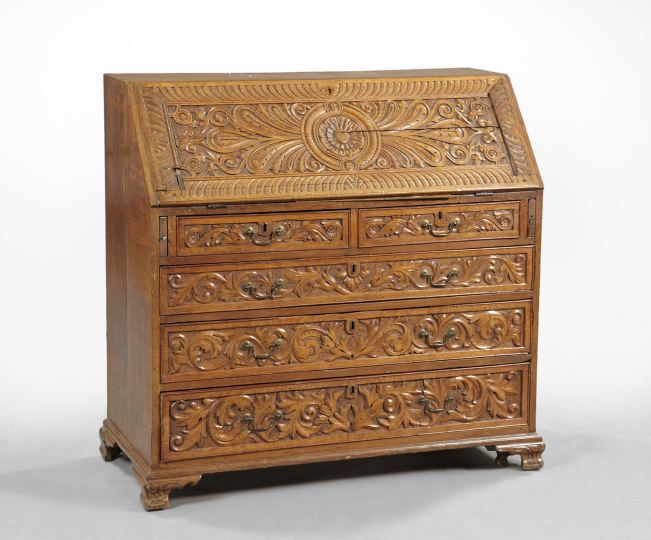 Appraisal: Continental Highly Carved Oak Bureau early th century in the