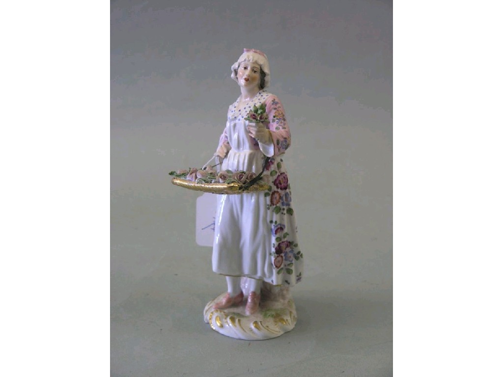 Appraisal: A German porcelain figure of lady holding a posy of