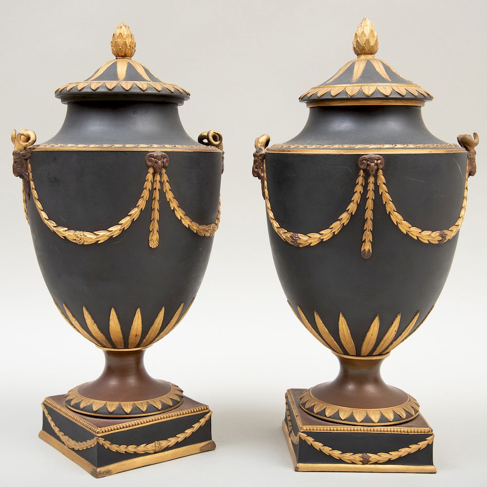 Appraisal: Pair of Wedgwood Black Basalt Bronze and Gilt-Decorated Vases and