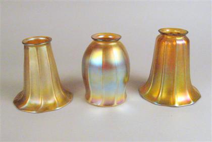 Appraisal: Group of three iridescent glass shades Comprising two signed L