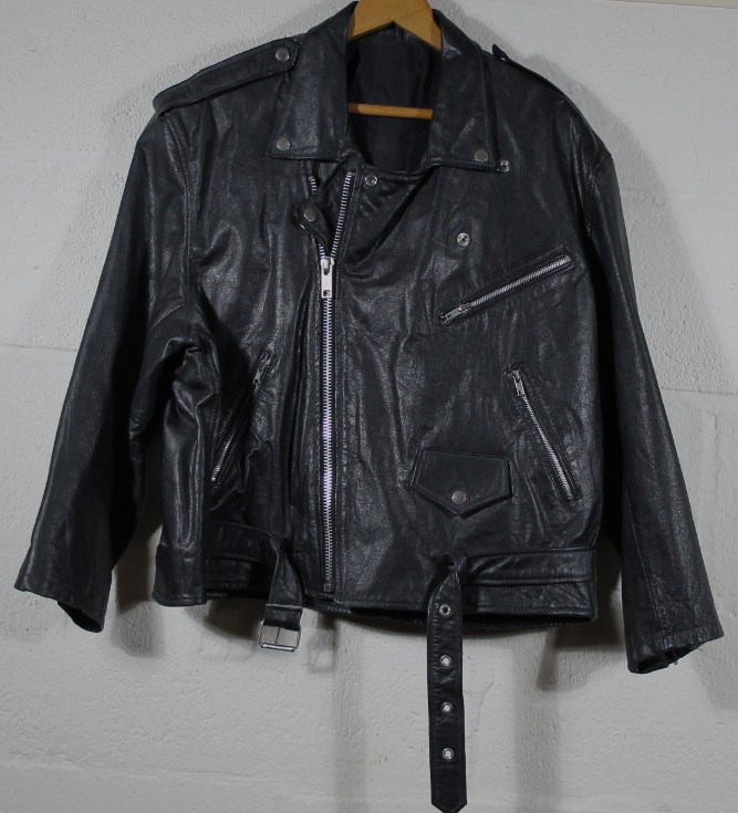 Appraisal: A vintage black leather jacket with chrome style studs size