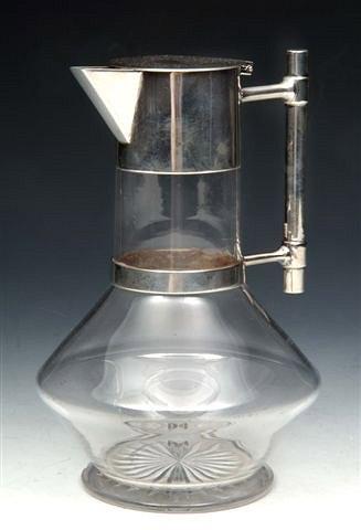 Appraisal: A SILVER MOUNTED GLASS CLARET JUG after Christopher Dresser London