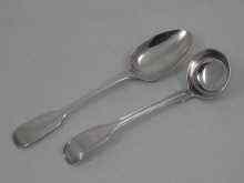 Appraisal: An Irish silver fiddle pattern dessert spoon P W Dublin