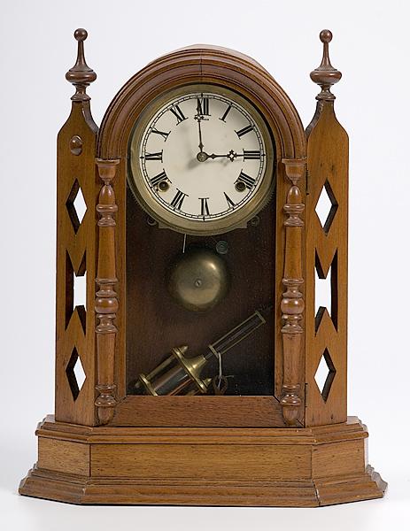 Appraisal: ANSONIA WALNUT SHELF CLOCK Eight-day time and strike ca in