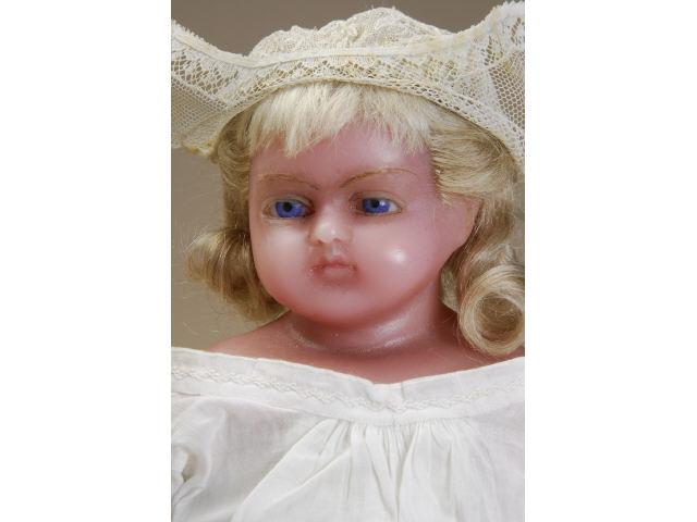 Appraisal: English Wax Child Doll England ca poured rose-toned wax shoulder