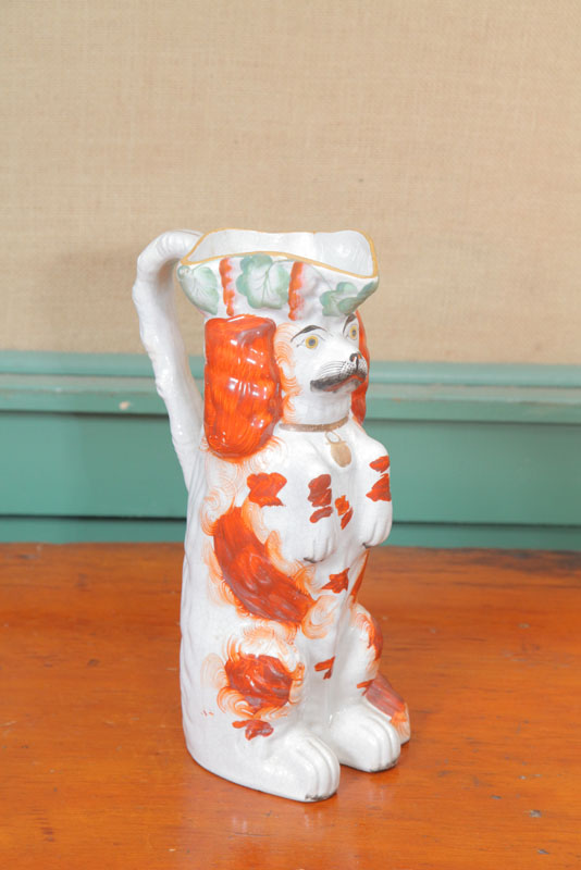 Appraisal: STAFFORDSHIRE PITCHER In the form of a Spaniel sitting up