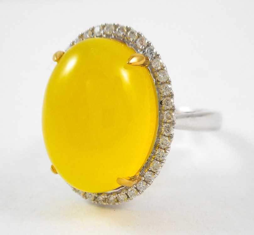 Appraisal: GOLDEN PREHNITE AND DIAMOND RING k white and yellow gold