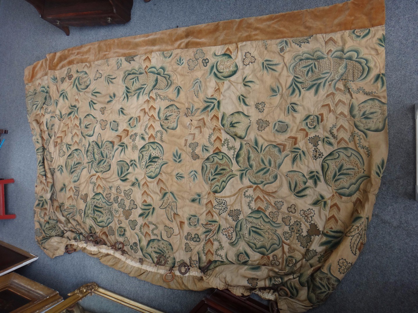 Appraisal: A crewel work curtain with green floral sprays cm x