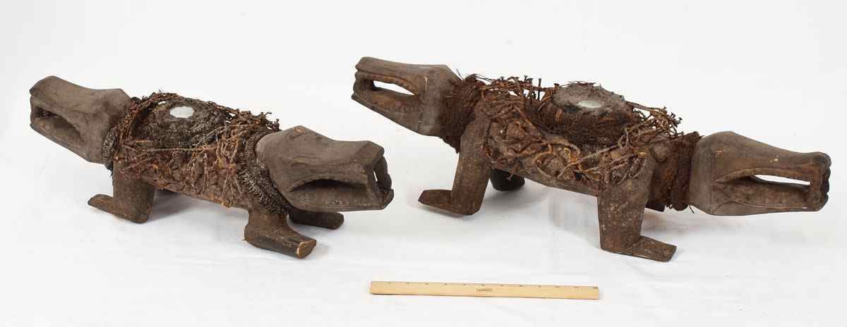 Appraisal: PAIR CARVED AFRICAN JANUS FETISH CROCODILE FIGURES '' x ''