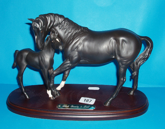 Appraisal: Black Beauty Foal On Wood Base Seconds DA