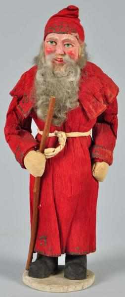 Appraisal: Rare Crepe Paper Father Christmas Description Wine-colored robe trimmed in