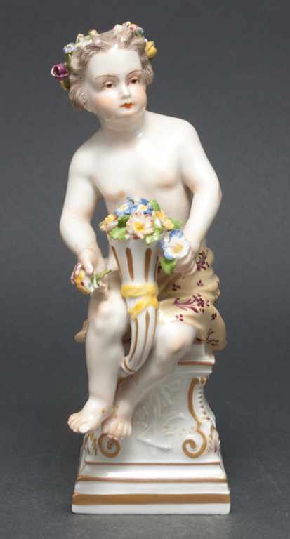 Appraisal: Ludwigsburg porcelain putti figure th century figure modeled sitting on