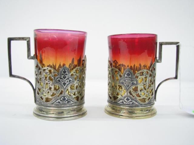 Appraisal: Pair of Russian silver tea glass holders with enameled decoration