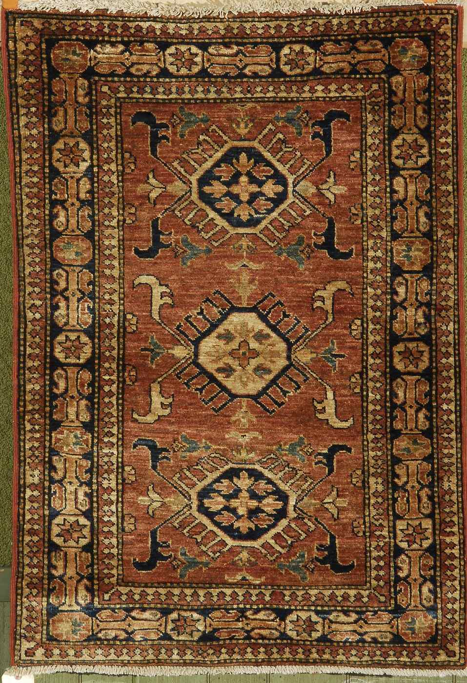 Appraisal: ORIENTAL RUG KAZAK DESIGN ' x ' '' Three latch