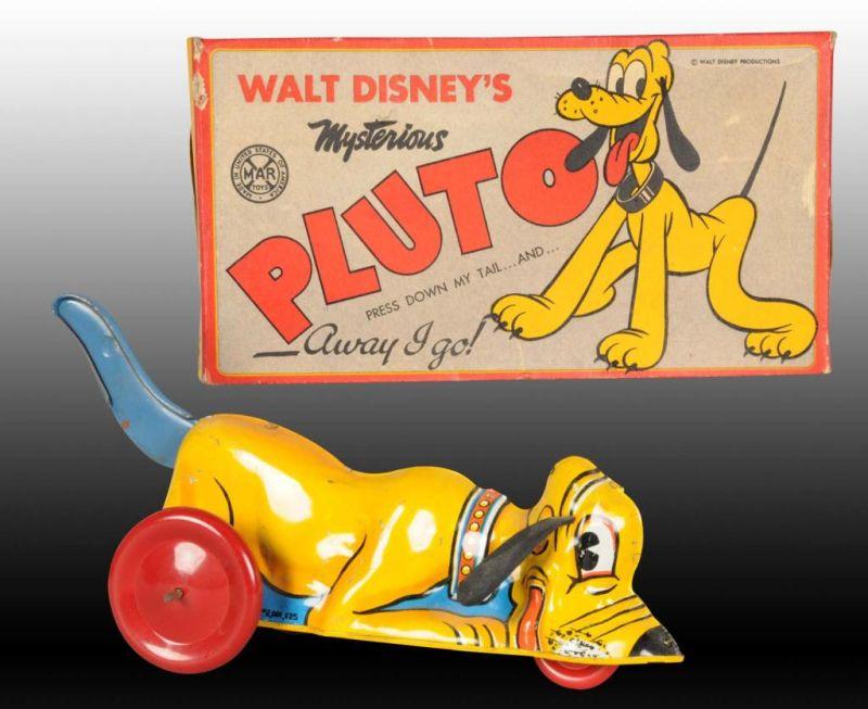 Appraisal: Walt Disney Marx Tin Wind-Up Mysterious Pluto Toy Description Includes