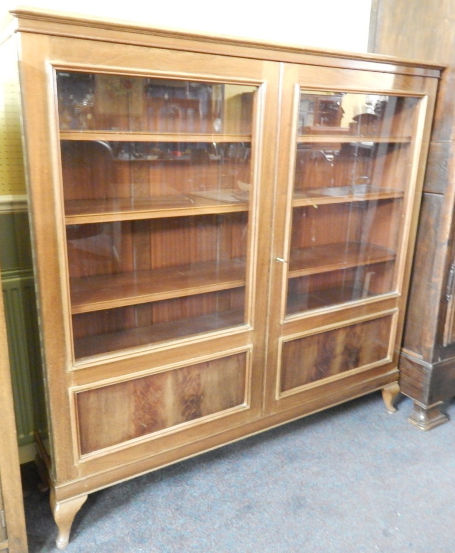 Appraisal: A French walnut display cabinet the rectangular top with a