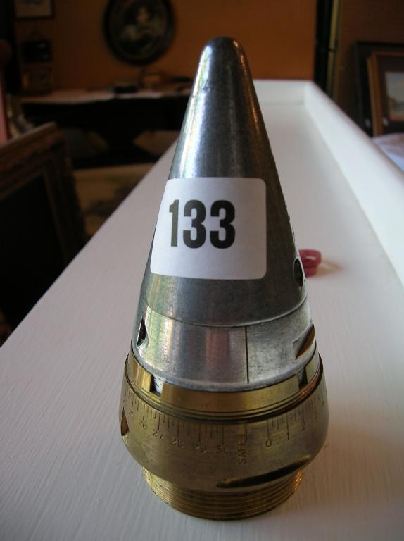 Appraisal: A British No artillery shell time fuse dated engraved From