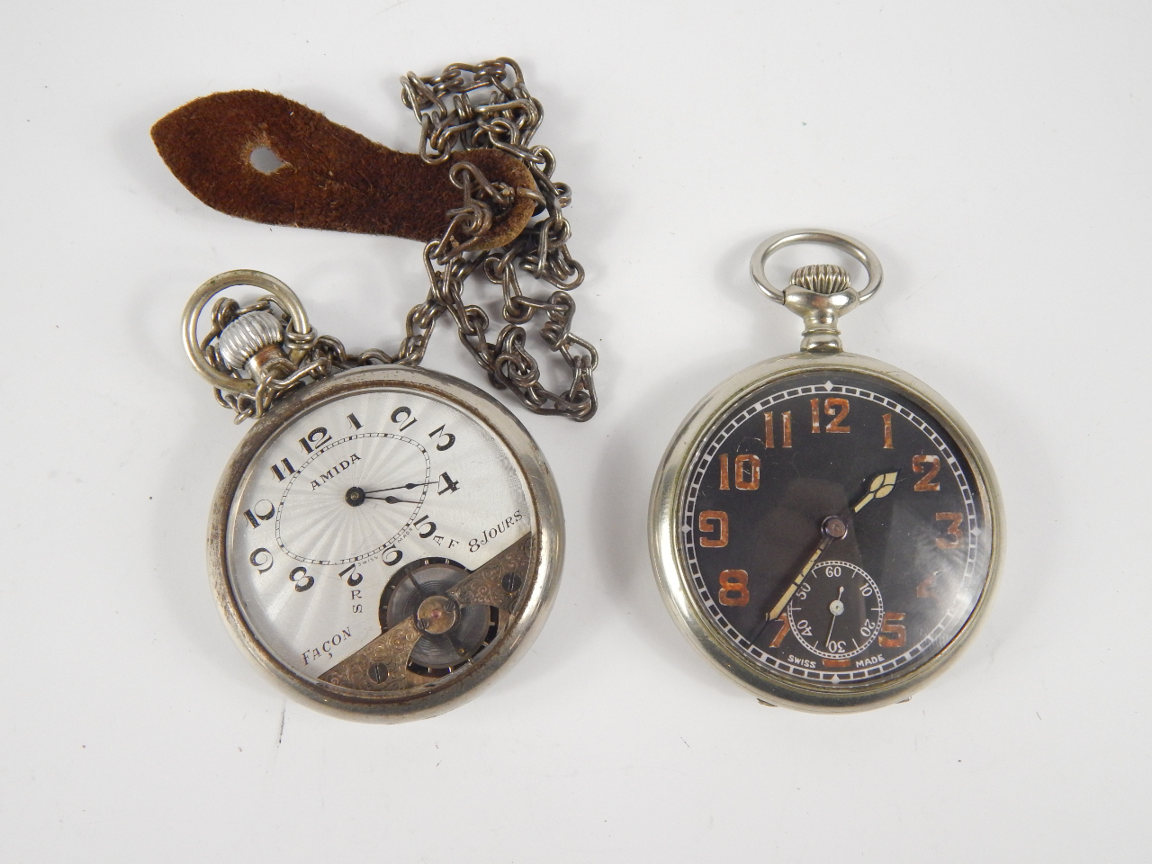 Appraisal: An Amida gentleman's open faced keyless wind pocket watch engine