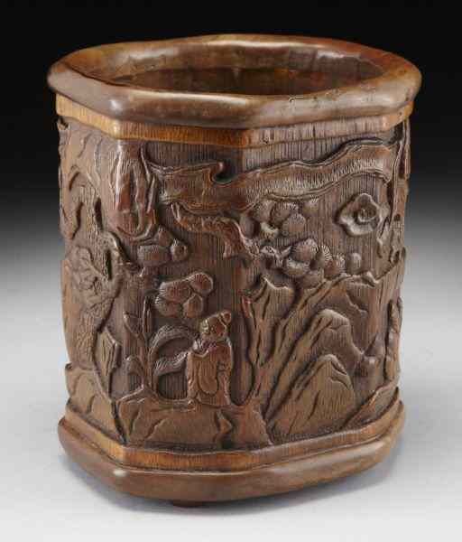 Appraisal: Chinese Qing carved bamboo brush pot depictingfigures in a landscape