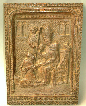 Appraisal: A th century mediaeval style rectangular oak panel carved with