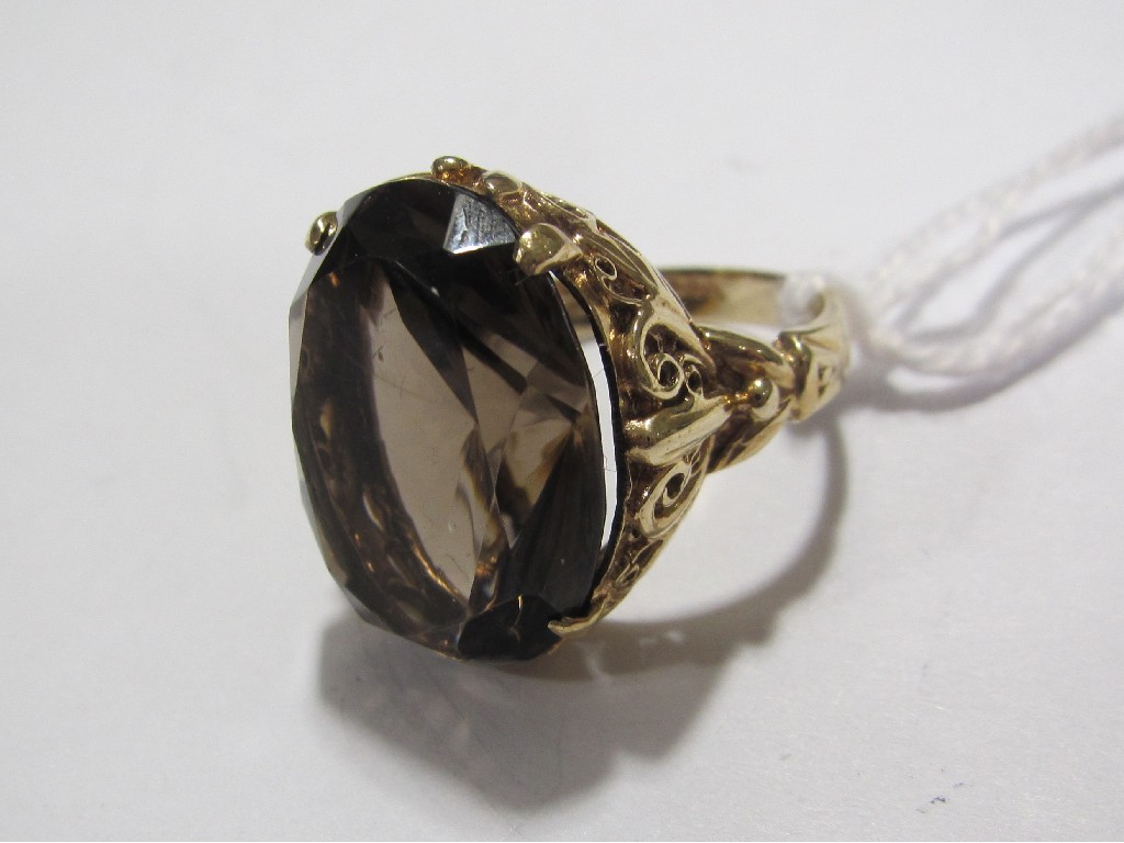 Appraisal: Nine carat gold smokey topaz single stone ring