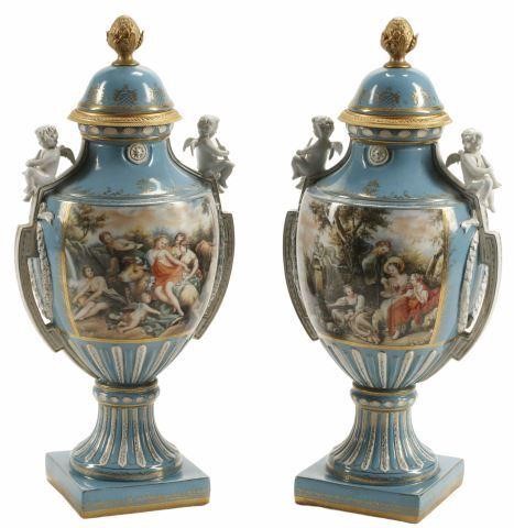 Appraisal: pair French Sevres style covered porcelain urns lids having pineapple