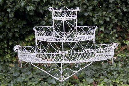 Appraisal: A Regency three tier wirework garden planter the graduated demi-lune