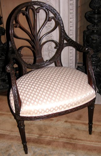 Appraisal: Title Carved Mahogany Oval-back open armchair with turned and reeded