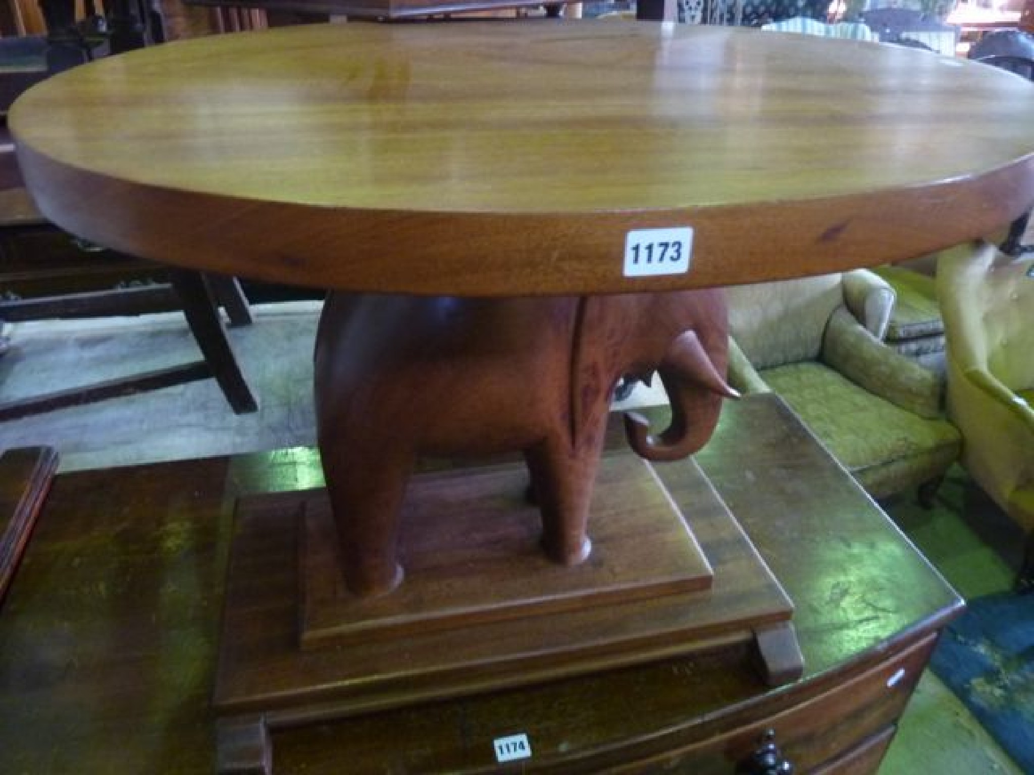 Appraisal: An Nigerian hardwood occasional table of oval form with carved