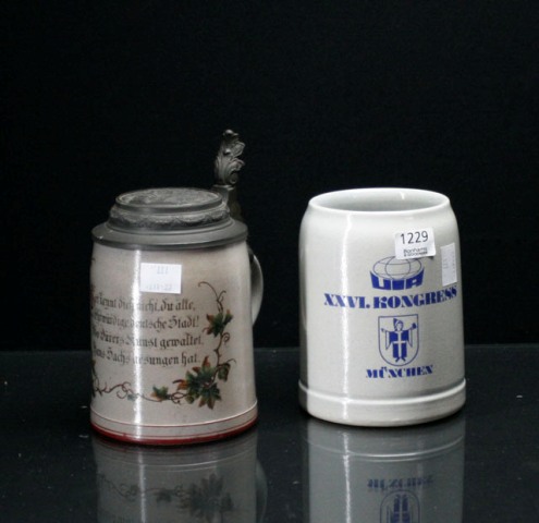 Appraisal: Two German steins one with a pewter lid together with