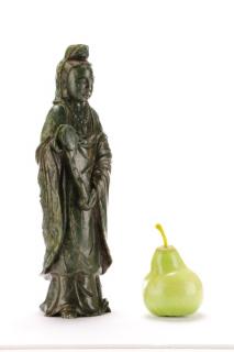 Appraisal: Chinese Carved Spinach Jade Guanyin Chinese th century A carved