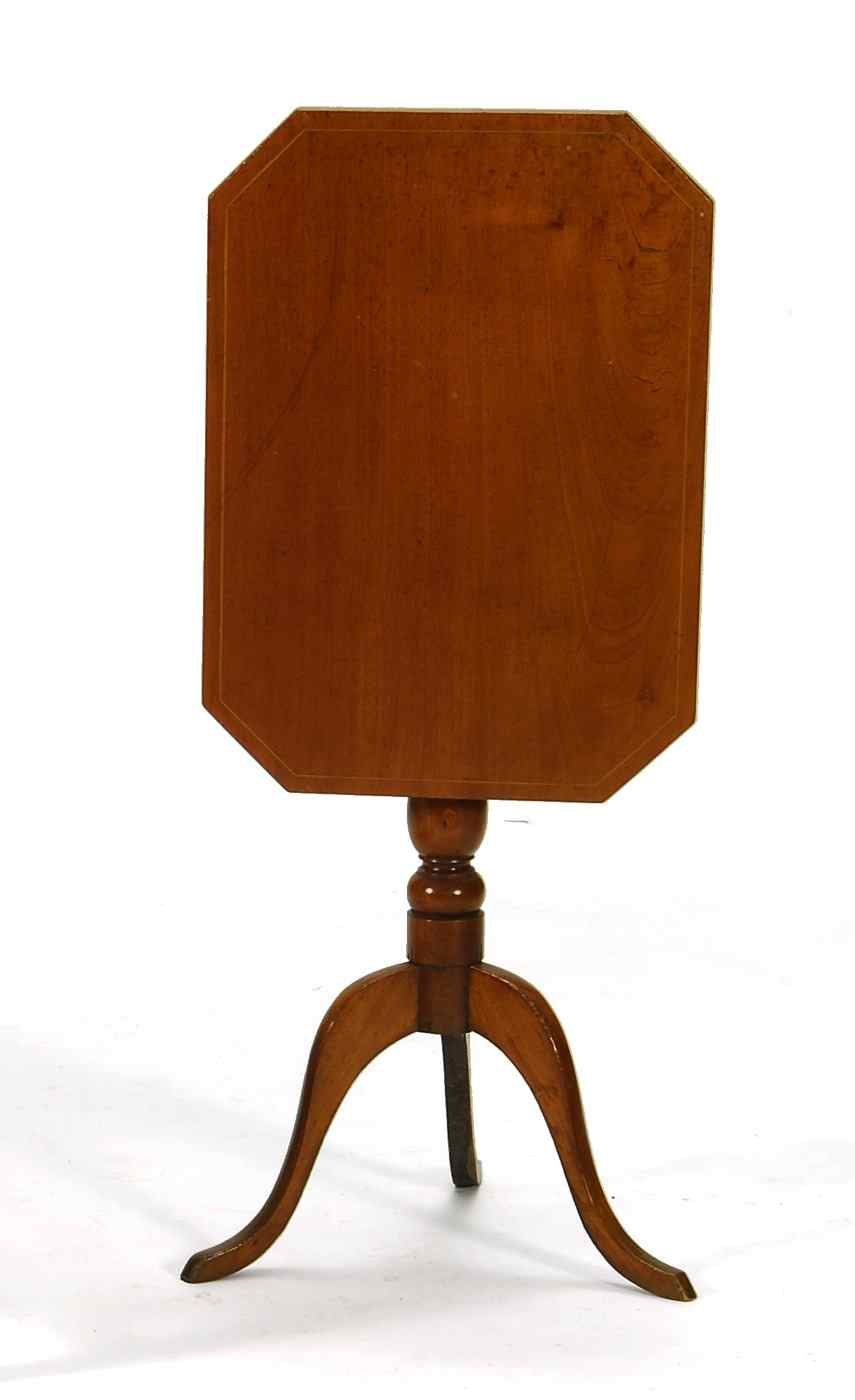 Appraisal: ANTIQUE AMERICAN TILT-TOP STANDEarly th CenturyIn mahogany with string inlay