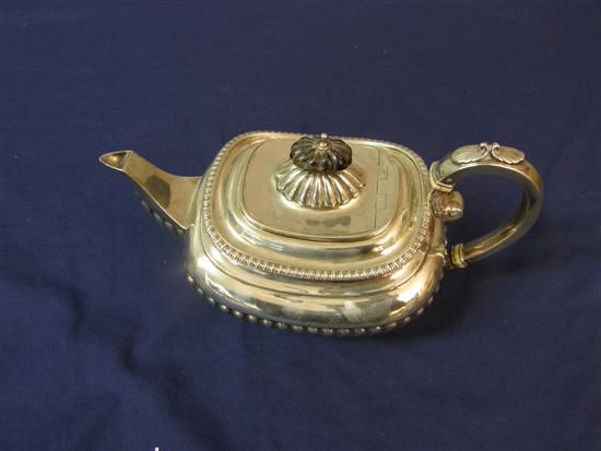 Appraisal: Edward VII silver teapot with half gadrooned body and scrolling