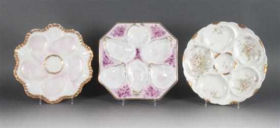 Appraisal: Two German porcelain oyster plates and a Limoges porcelain oyster