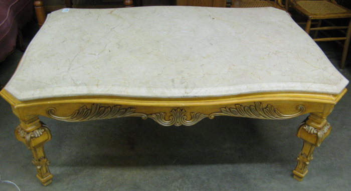 Appraisal: LOUIS XIV STYLE COFFEE TABLE having a rectangular bianco travertine