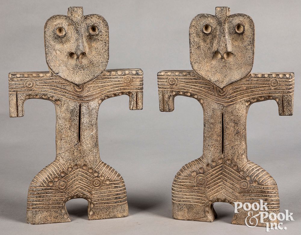 Appraisal: Pair of carved stone tribal figures Pair of carved stone