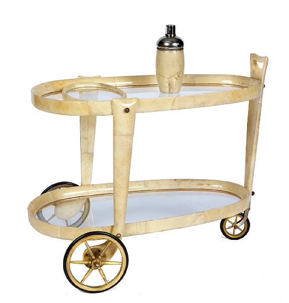 Appraisal: An Italian parchment lacquered bar cart probaby by Aldo Tura