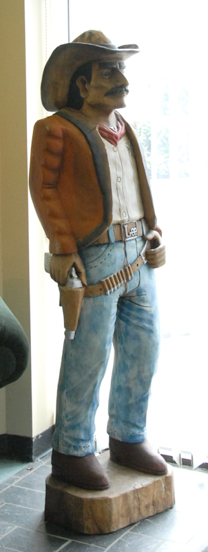 Appraisal: A Carved Wood and Polychromed Lee Jeans Cowboy Figure wearing