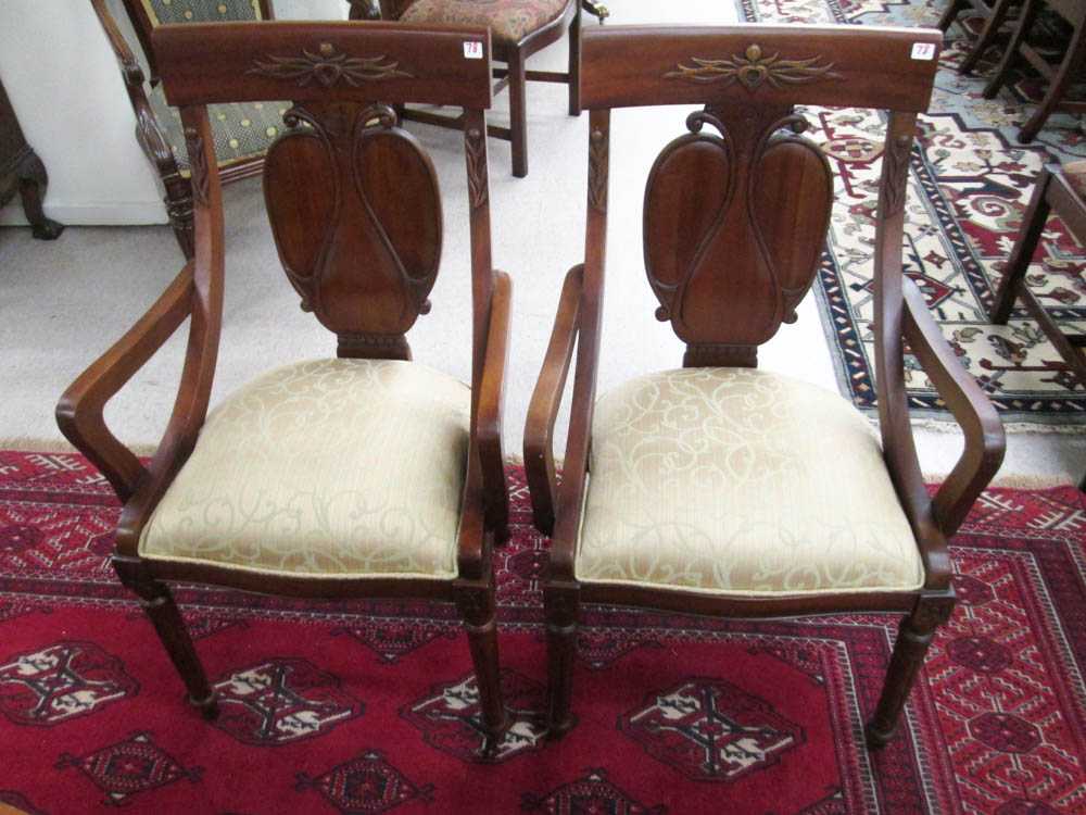 Appraisal: A SET OF SEVEN CARVED MAHOGANY DINING ARMCHAIRS recent antique