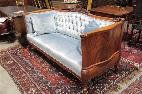 Appraisal: SOFA Mahogany veneered having a shell carved crest high sides