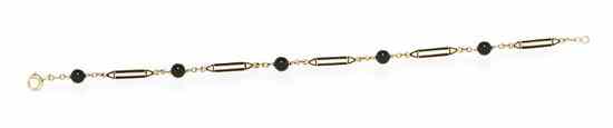 Appraisal: A Karat Yellow Gold Polychrome Enamel and Onyx Bracelet containing