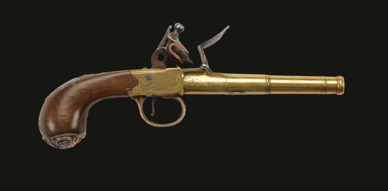 Appraisal: A British Coat Pistol with a brass box lock flintlock