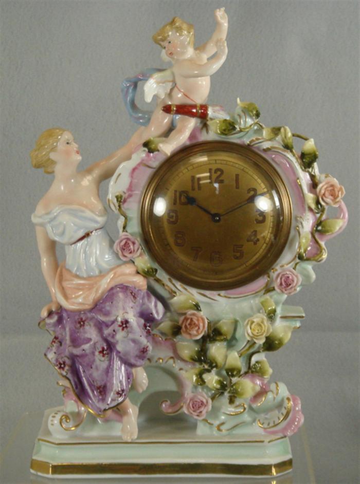 Appraisal: French porcelain figural mantle clock j movement missing leaves h