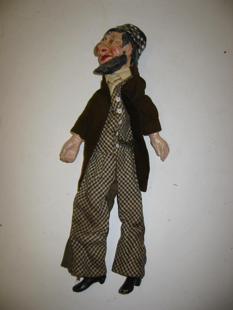 Appraisal: A glove puppet early th century depicting an old Jewish