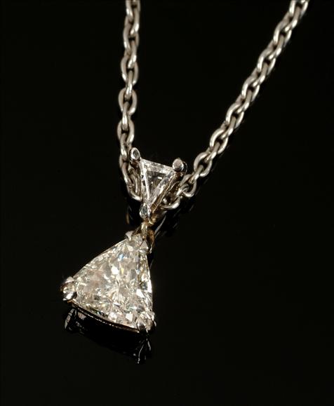 Appraisal: A diamond pendant the trilliant cut diamond drop approximately carats