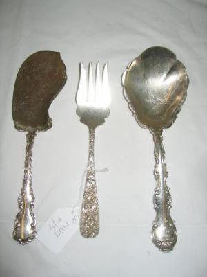 Appraisal: AN AMERICAN SERVING SPOON and cake trowel the spoon with