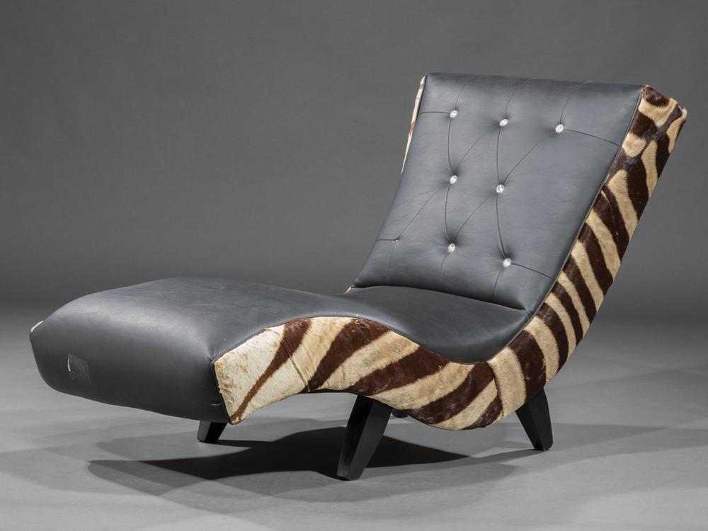 Appraisal: Contemporary Leather Lounge Chair button tufted back zebra skin sides